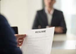 job interview in which applicant undergoes pre-employment screening