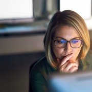 businesswoman conducting employee background screening re-checks