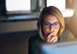 businesswoman conducting employee background screening re-checks