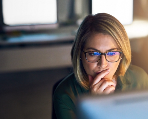 businesswoman conducting employee background screening re-checks