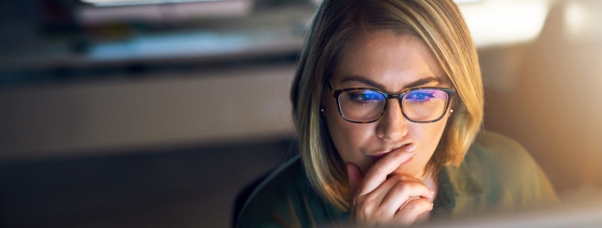 businesswoman conducting employee background screening re-checks