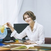 teacher in school at desk