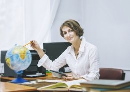 teacher in school at desk