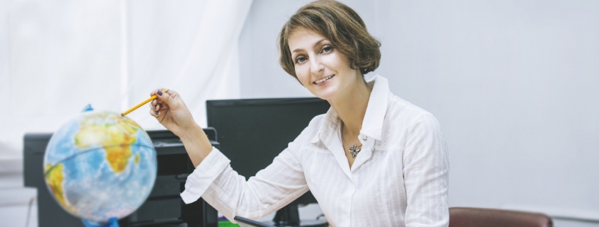 teacher in school at desk