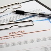 picture of a resume and job application that will undergo education verification by a background check provider