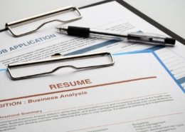 picture of a resume and job application that will undergo education verification by a background check provider