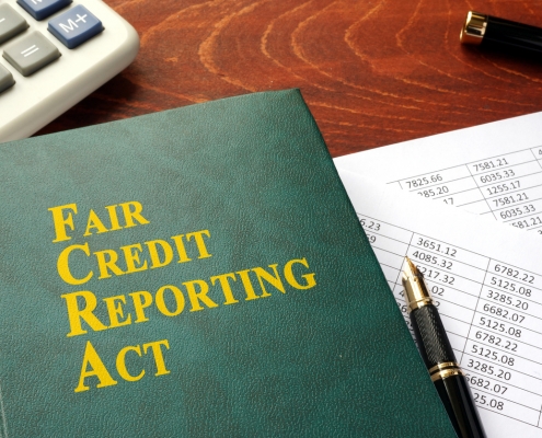 Fair Credit Reporting Act on a messy desk