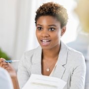 businesswoman discussing professional background checks with her customer