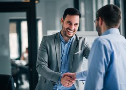 background check provider shaking hands at interview