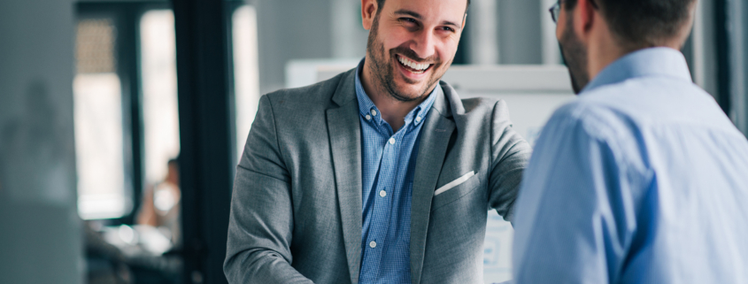 background check provider shaking hands at interview