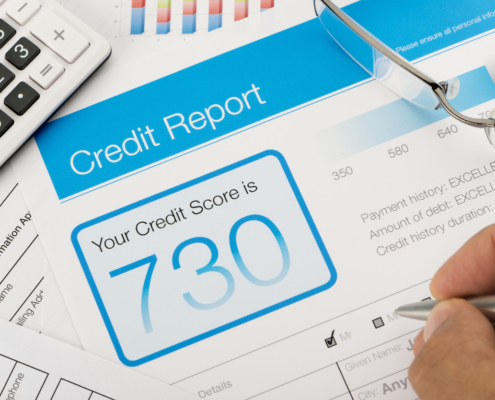 Credit reports with score on a desk
