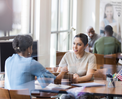 background check consultant speaking with a potential employee