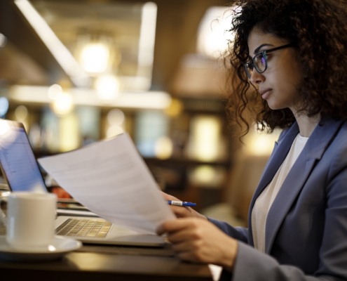 A businesswoman checking references as a part of employment verification