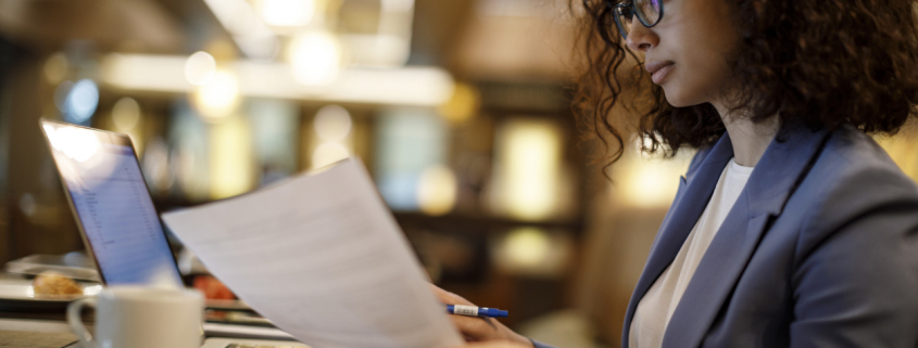 A businesswoman checking references as a part of employment verification